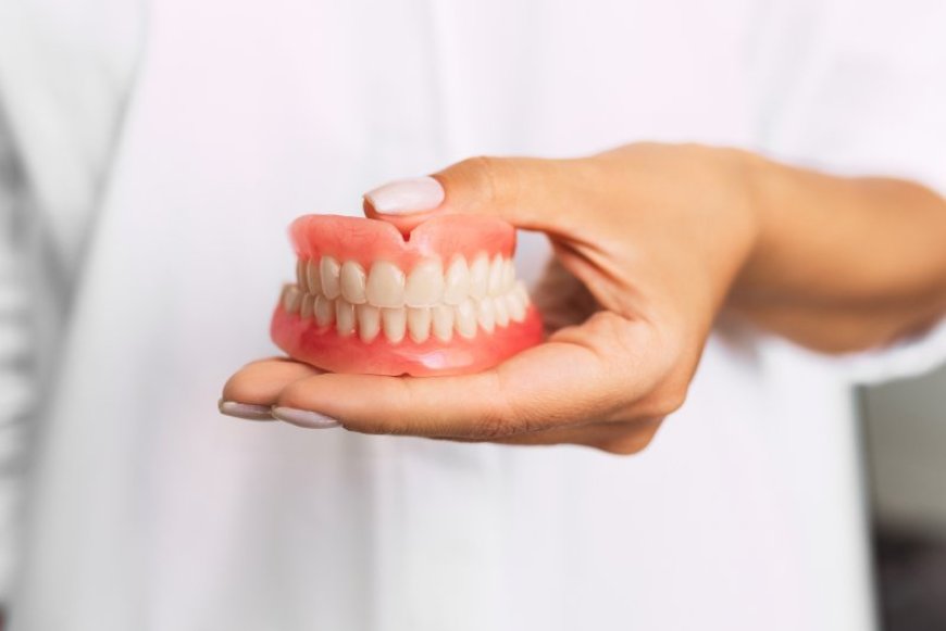 The History and Evolution of Dentures: From Ancient Times to Modern Smiles