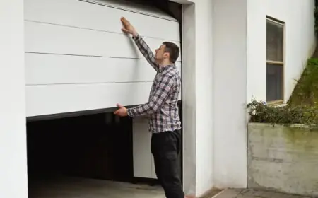 What Causes Garage Door Dents and How Are They Repaired in Minneapolis?