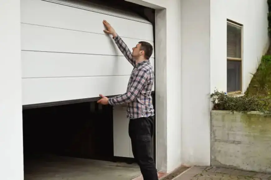 What Causes Garage Door Dents and How Are They Repaired in Minneapolis?