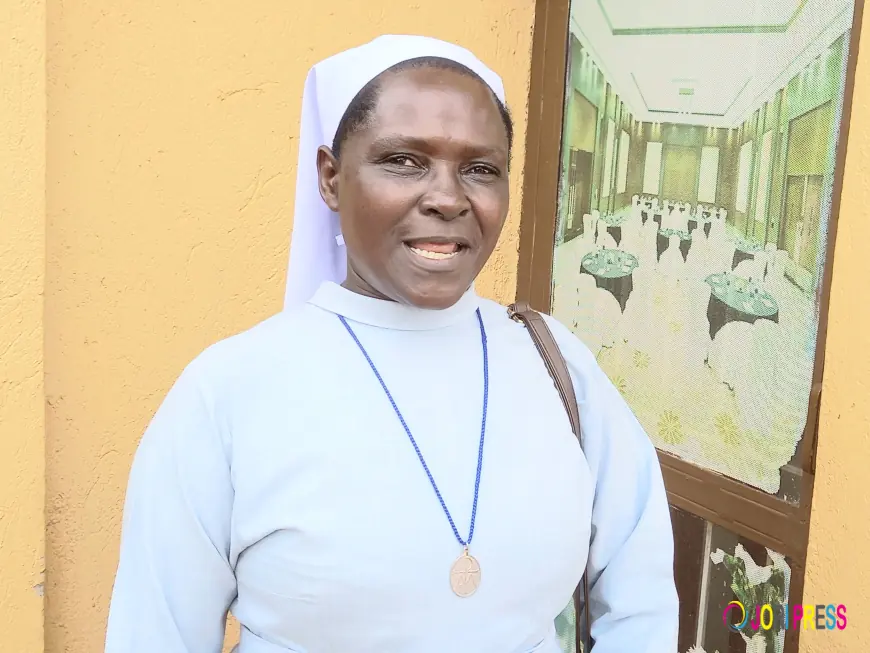 Namukobe Ritah lifts Budadiri Girls SS UACE flag high 